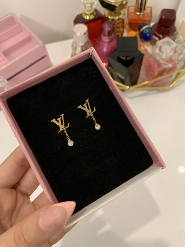 Boucle d’oreille louis Vuitton ✨