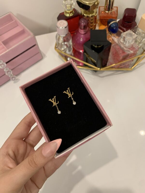 Boucle d’oreille louis Vuitton ✨