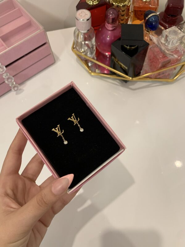 Boucle d’oreille louis Vuitton ✨